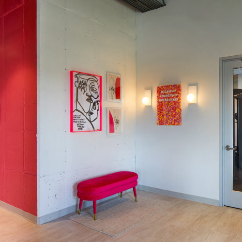 Swivel_multifamily_housing_pink_art_interior